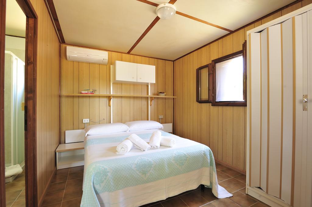 Villaggio Camping Tesonis Beach Tertenìa Chambre photo
